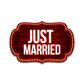 Red sign with 'Just Married' text on a white background