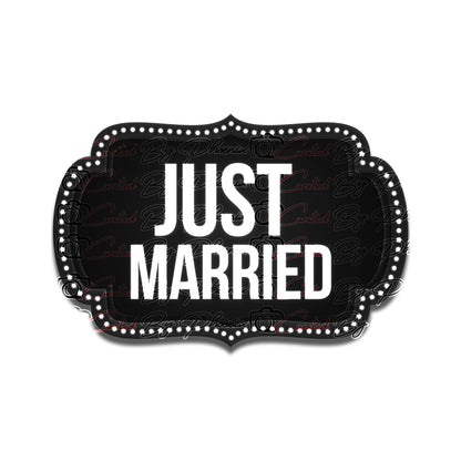 Decorative sign with 'Just Married' text on a black background