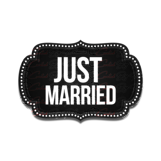 Decorative sign with 'Just Married' text on a black background