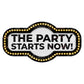 A novelty sign or magnet featuring the text 'THE PARTY STARTS NOW!' in bold black letters on a white textured background, surrounded by a black border with glowing yellow light bulbs.